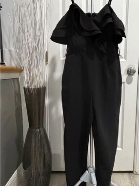 Main Strip Black Ruffled Off Shoulder Jumpsuit